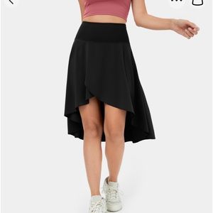 New with tag Halara High waisted Asymmetric Ruffle 2-n-1 dance skirt